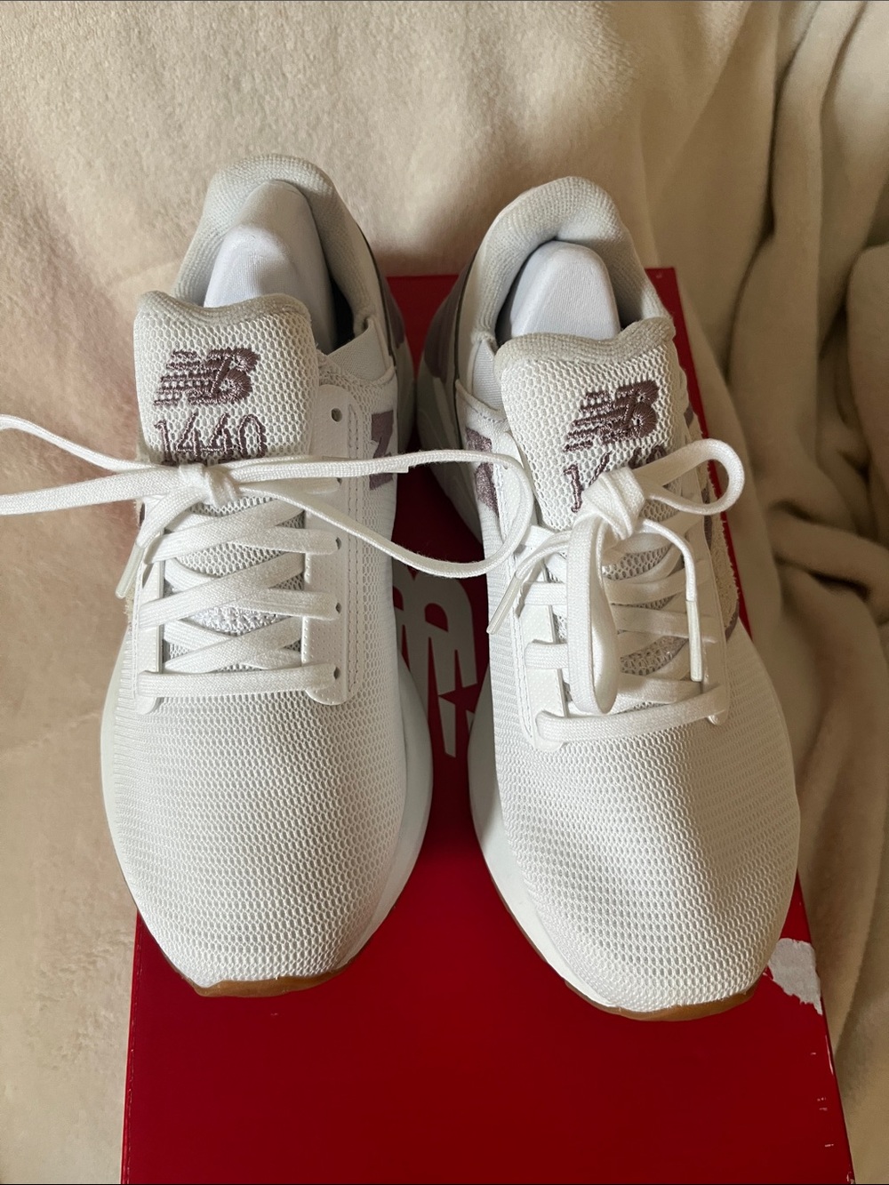 New Balance Women's Athletic Sneakers in White with Light Gray Logo